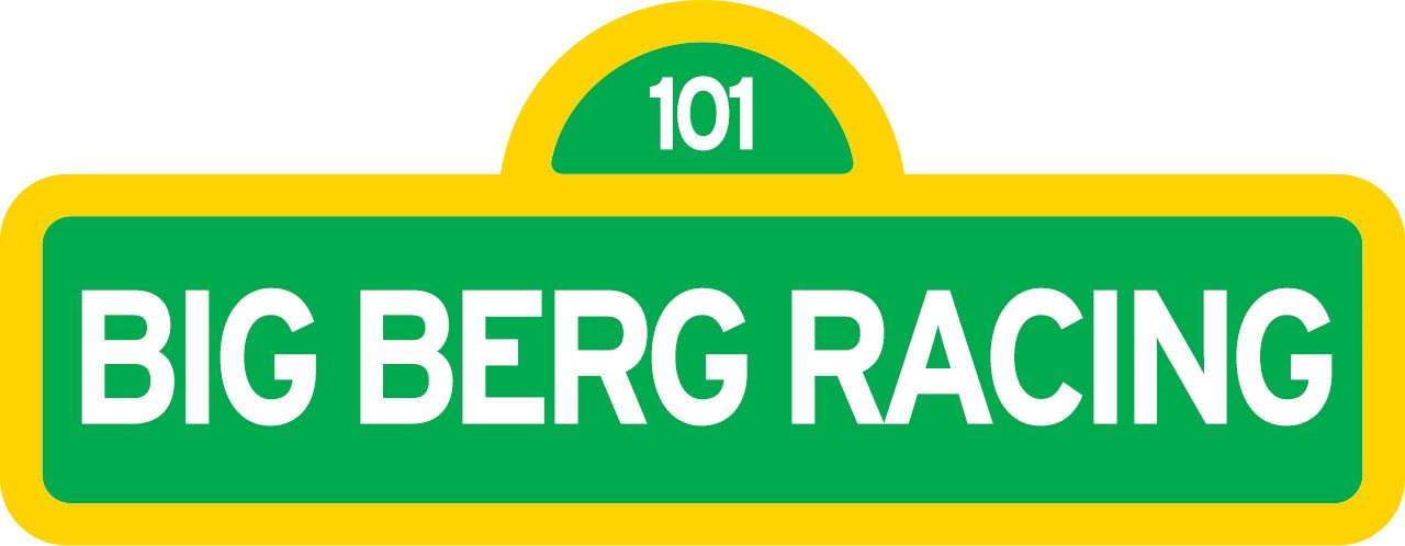A green-and-yellow highway shield reading BIG BERG RACING 101