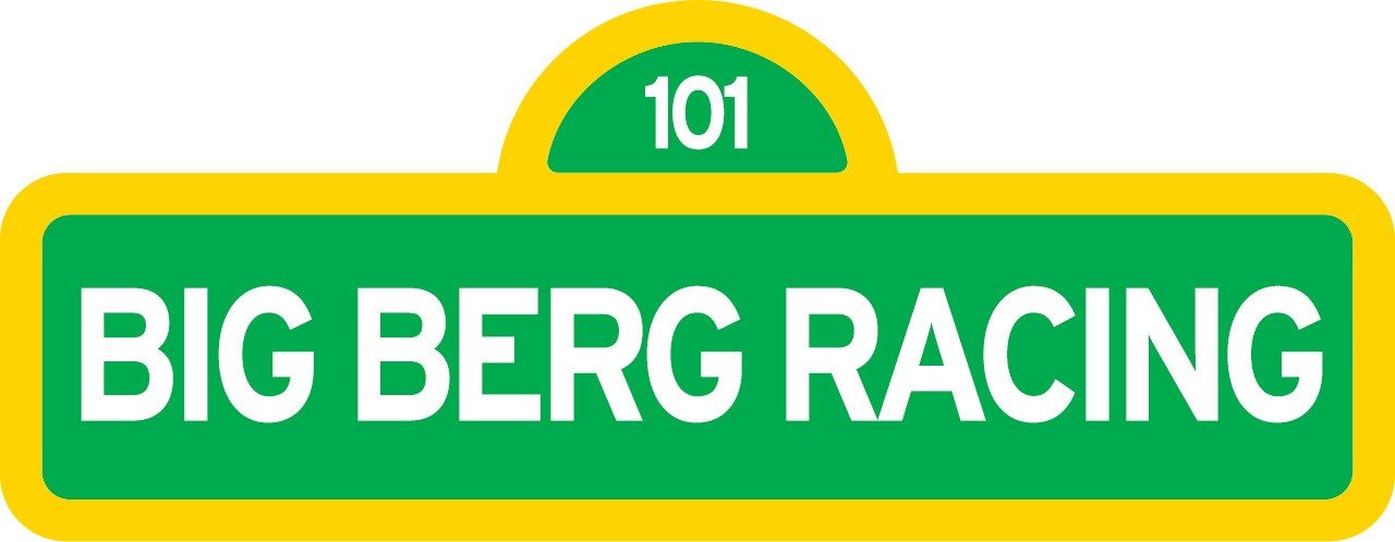 A green-and-yellow highway shield reading BIG BERG RACING 101