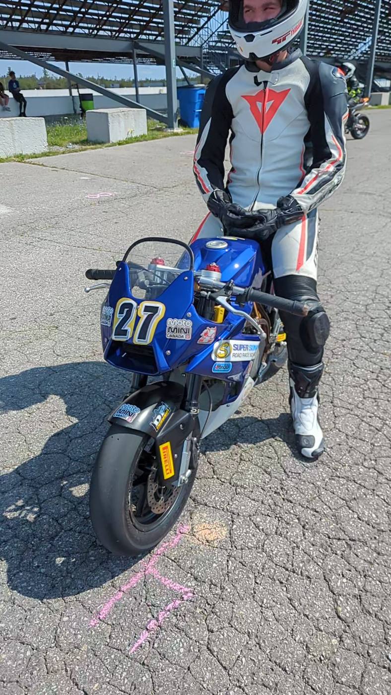 A rider and bike on the Shannonville grid at round three
