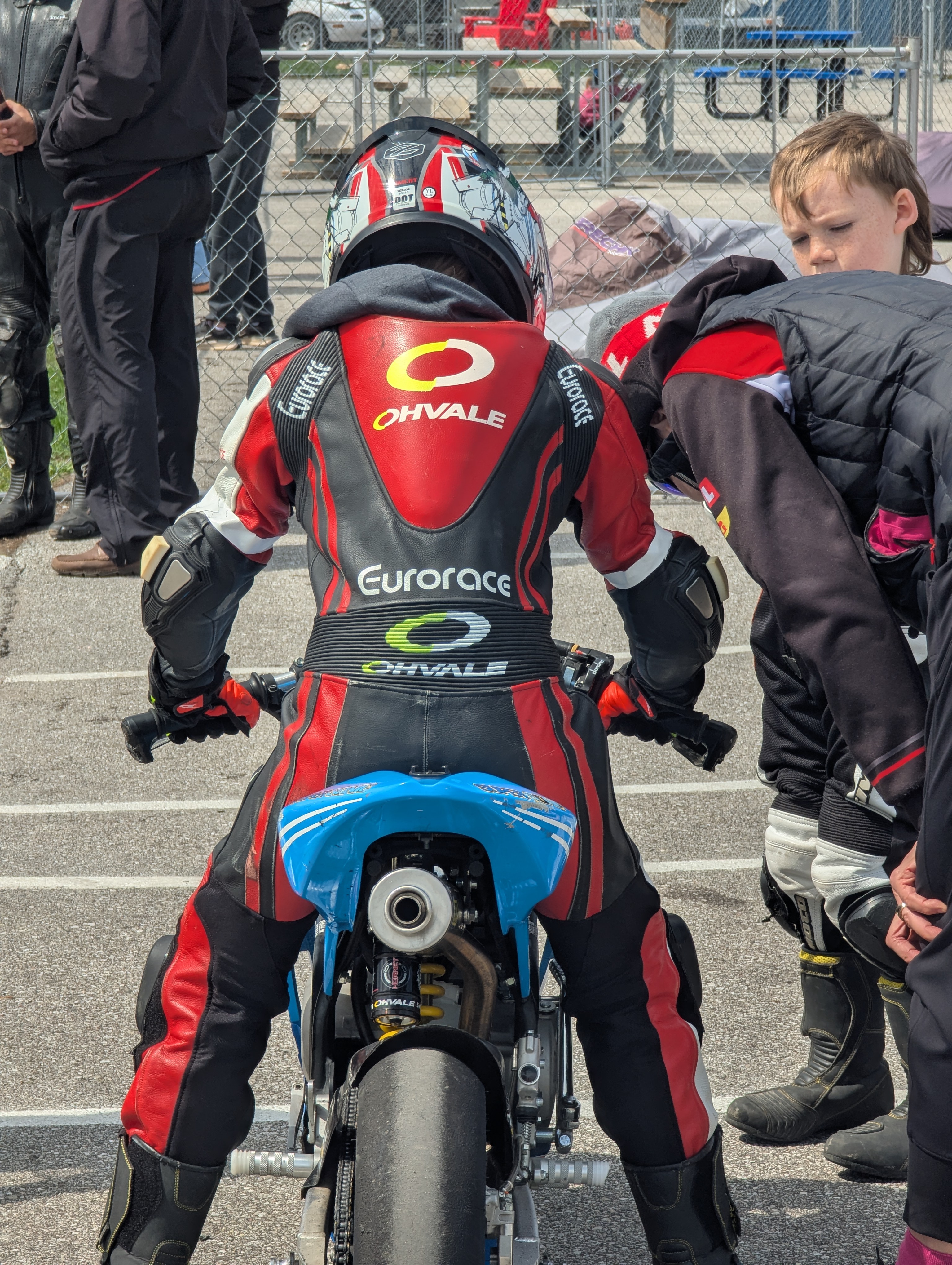 A rider in full leathers and helmet on the grid at Brechin